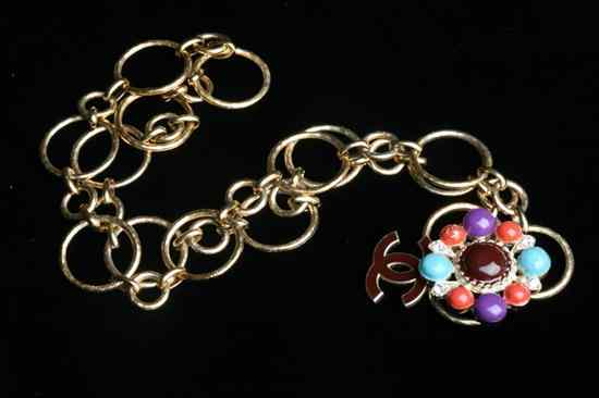 Appraisal: CHANEL POLYCHROME GRIPOIX GOLD-TONE BELT Signed Autumn Adjustable chain belt