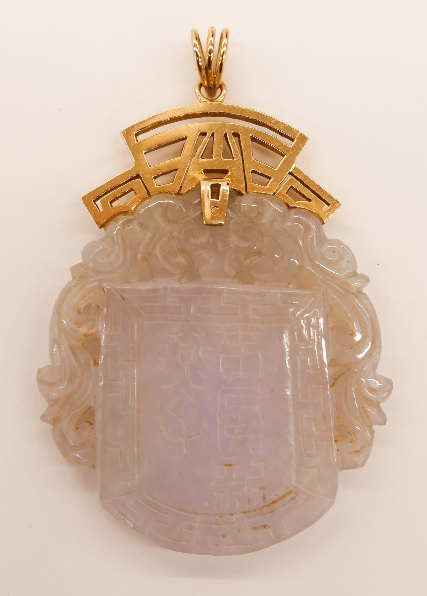 Appraisal: Chinese k Carved Jade Pendant ''x '' A translucent jadeite