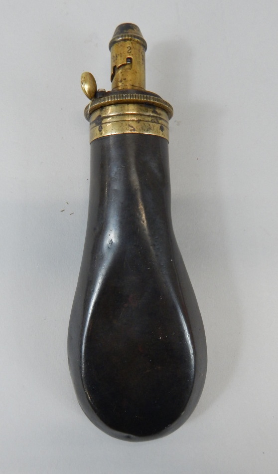 Appraisal: A copper and brass powder flask stamped Drams