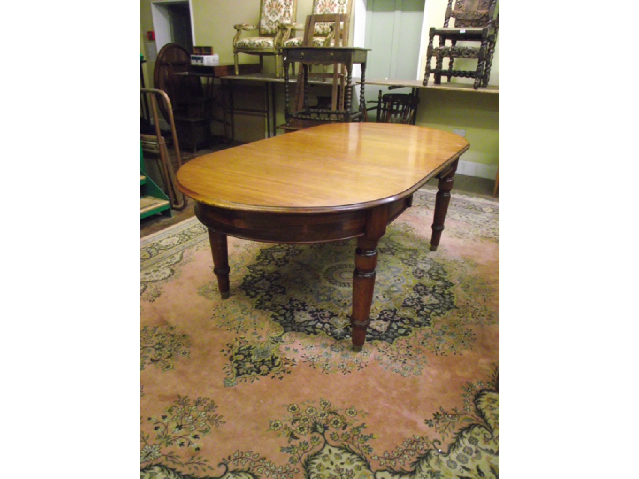 Appraisal: A Victorian mahogany D end extending dining table with single