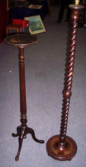 Appraisal: An Edwardian torch re the circular top on a reeded