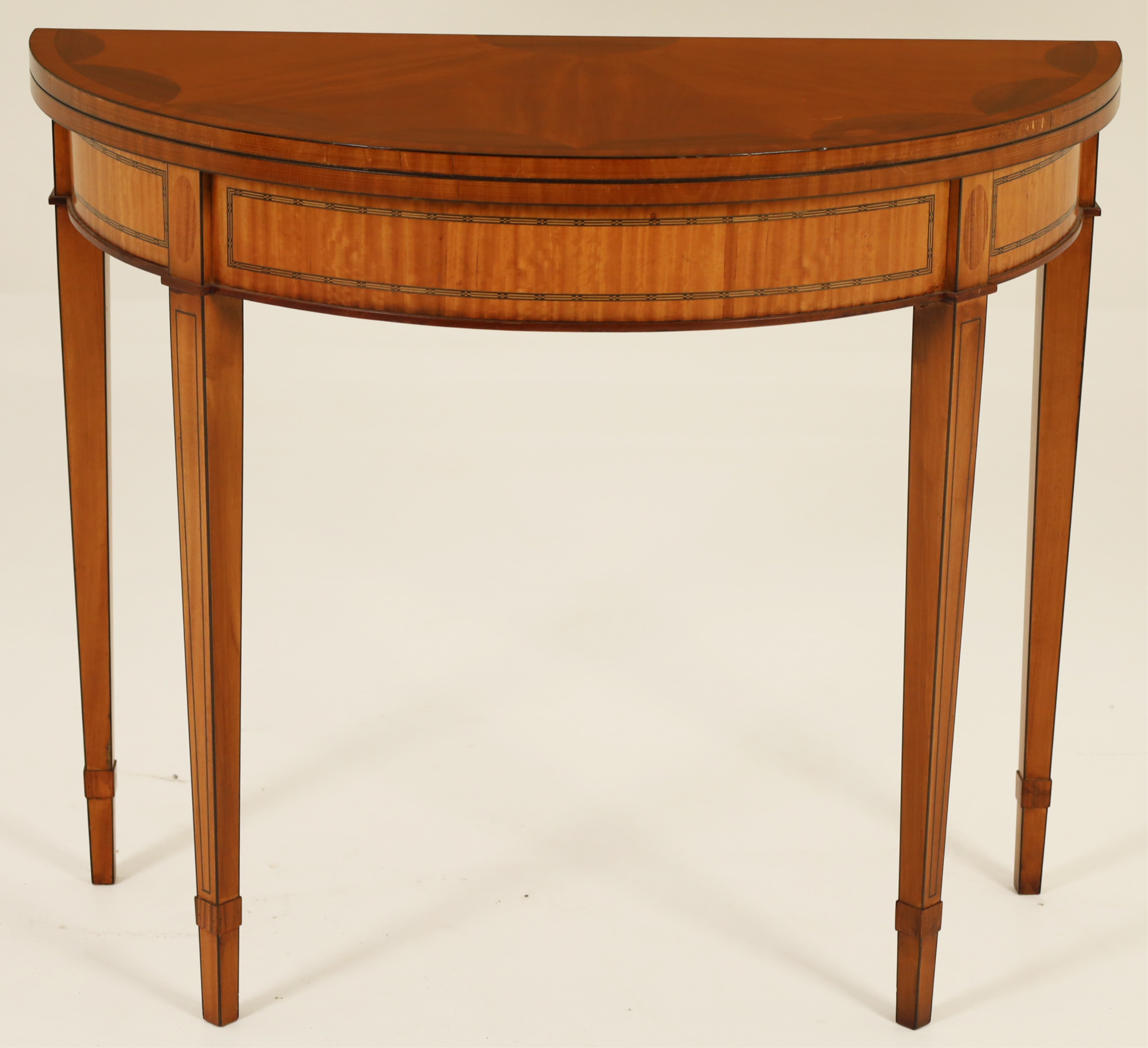 Appraisal: ENGLISH HEPPLEWHITE STYLE DEMILUNE TEA TABLE English Hepplewhite style satinwood