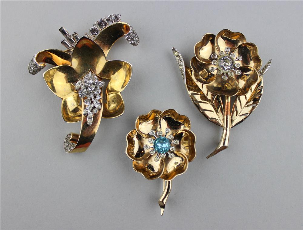 Appraisal: TWO BOUCHER NIGHT AND DAY BROOCHES AND A MAZER BROOCH