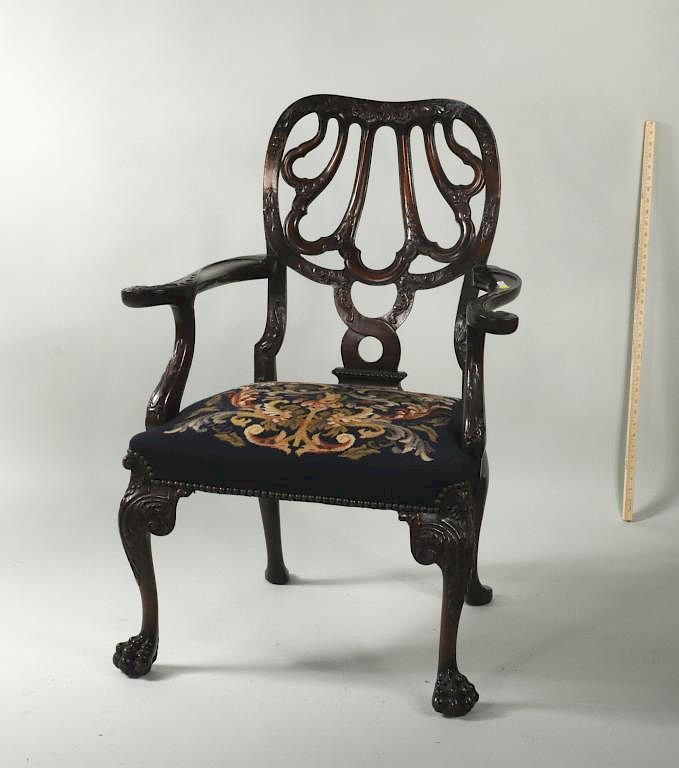 Appraisal: George II Style Carved Mahogany Open Armchair George II style