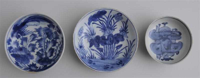 Appraisal: THREE CHINESE BLUE AND WHITE PORCELAIN BOWLS Two with floral