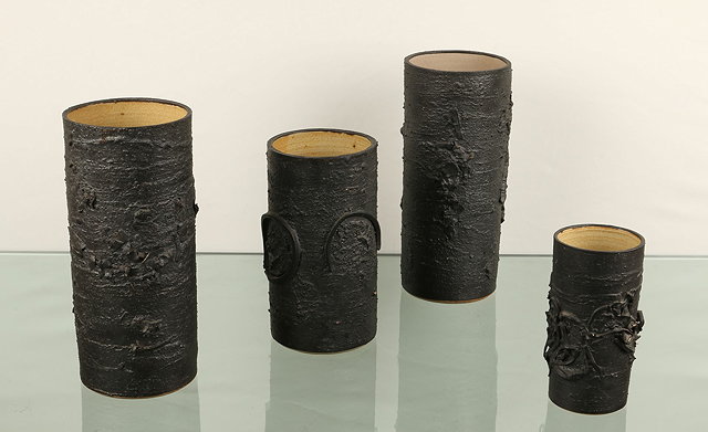 Appraisal: Eileen Lewenstein British - Four vasesof cylindrical form applied decoration