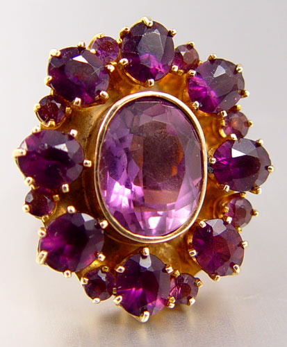 Appraisal: CTW AMETHYST RING K yellow gold ring contains oval shaped