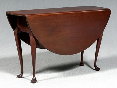 Appraisal: Queen Anne mahogany drop-leaf table maple or cherry legs round