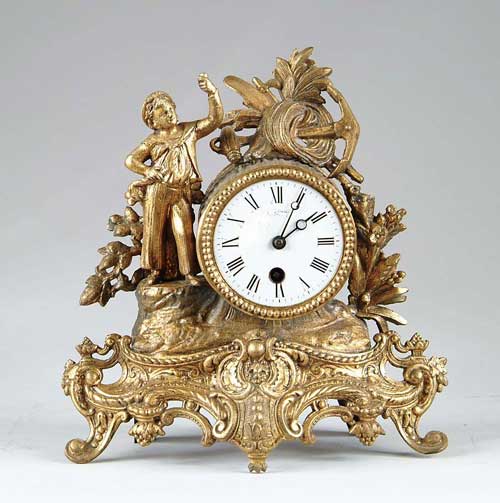 Appraisal: FIGURAL MANTLE CLOCK Gilt metal case has scroll designed fancy