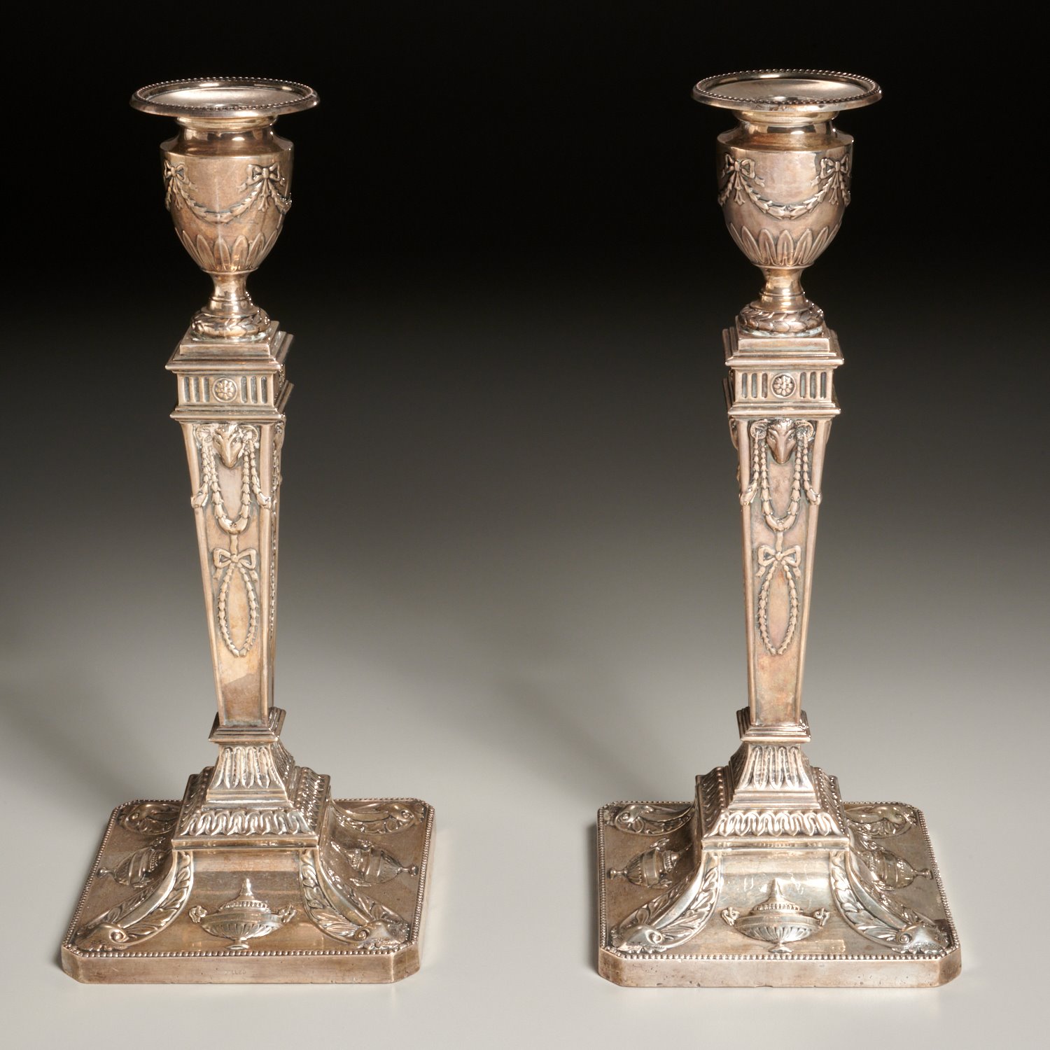 Appraisal: PAIR GEORGE V WEIGHTED SILVER CANDLESTICKS Dated England sterling silver