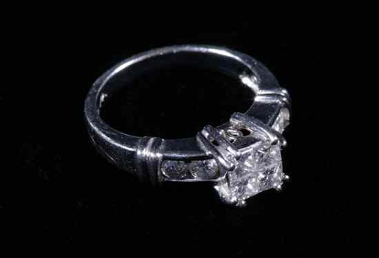 Appraisal: PLATINUM AND DIAMOND ENGAGEMENT TYPE RING Square of four matched