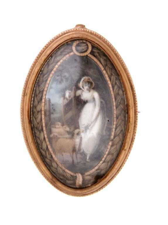 Appraisal: A GEORGE III GOLD MOURNING JEWEL the oval locket inset