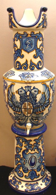 Appraisal: Water dispenser piece construction decorated with double eagle motif in