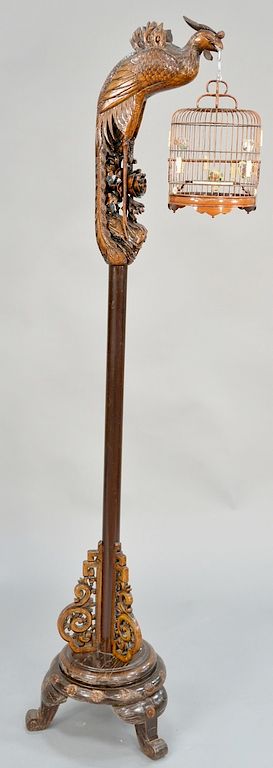 Appraisal: Chinese carved floor lamp stand carved form peacock holding a