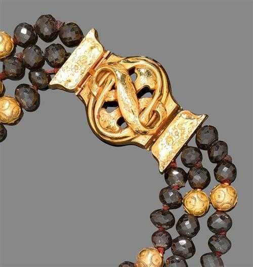 Appraisal: GARNET AND GOLD NECKLACE France ca Fastener and decorative beads