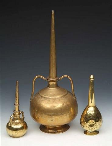 Appraisal: A GROUP OF THREE MIDDLE EASTERN GILT AND BRASS ROSEWATER