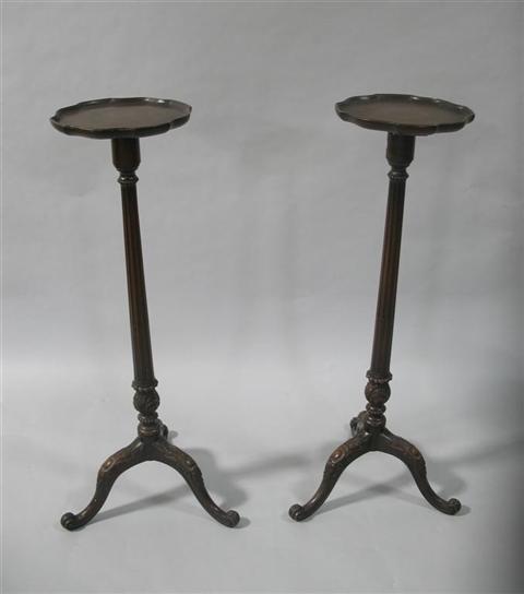 Appraisal: PAIR OF CHIPPENDALE STYLE PLANTSTANDS Circular tops with piecrust edges