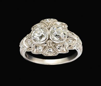 Appraisal: Platinum and diamond twin stone ring th century Set with