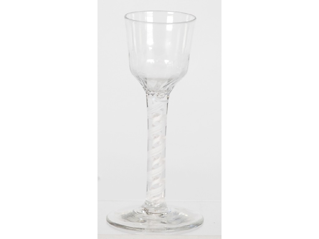 Appraisal: AN ANTIQUE OPAQUE TWIST WINE GLASS the ogee bowl above