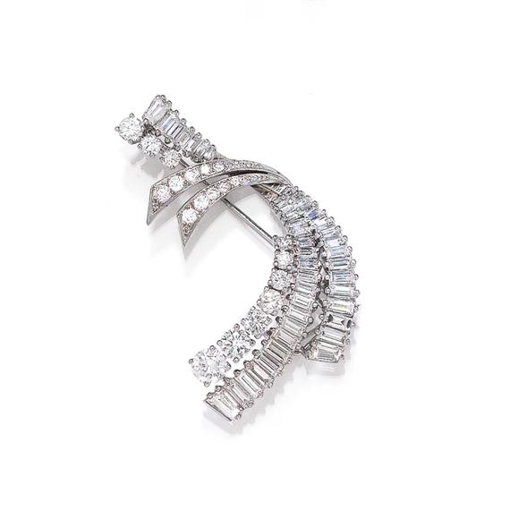 Appraisal: DIAMOND BROOCH White gold Very elegant brooch designed as stylised