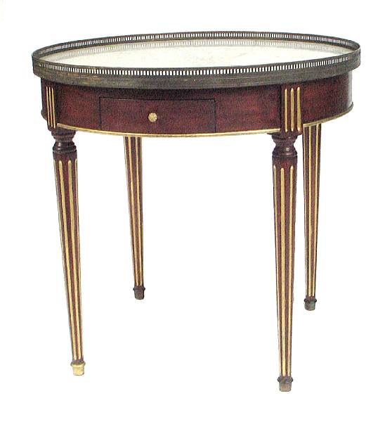 Appraisal: A Louis XVI style mahogany gueridon with marble top height