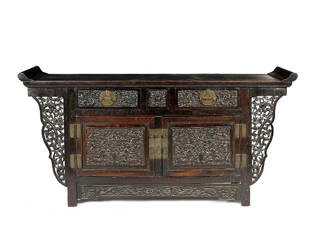 Appraisal: A Chinese hardwood side cabinet th th Centurywith carved panel