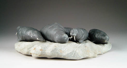 Appraisal: INTERESTED STONE SCULPTURE OF WALRUS S ON ICE FLOW The