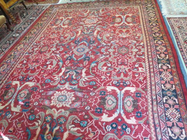 Appraisal: Bakhtiari Persian Handmade Room Size Rug stylized florals and geometrics