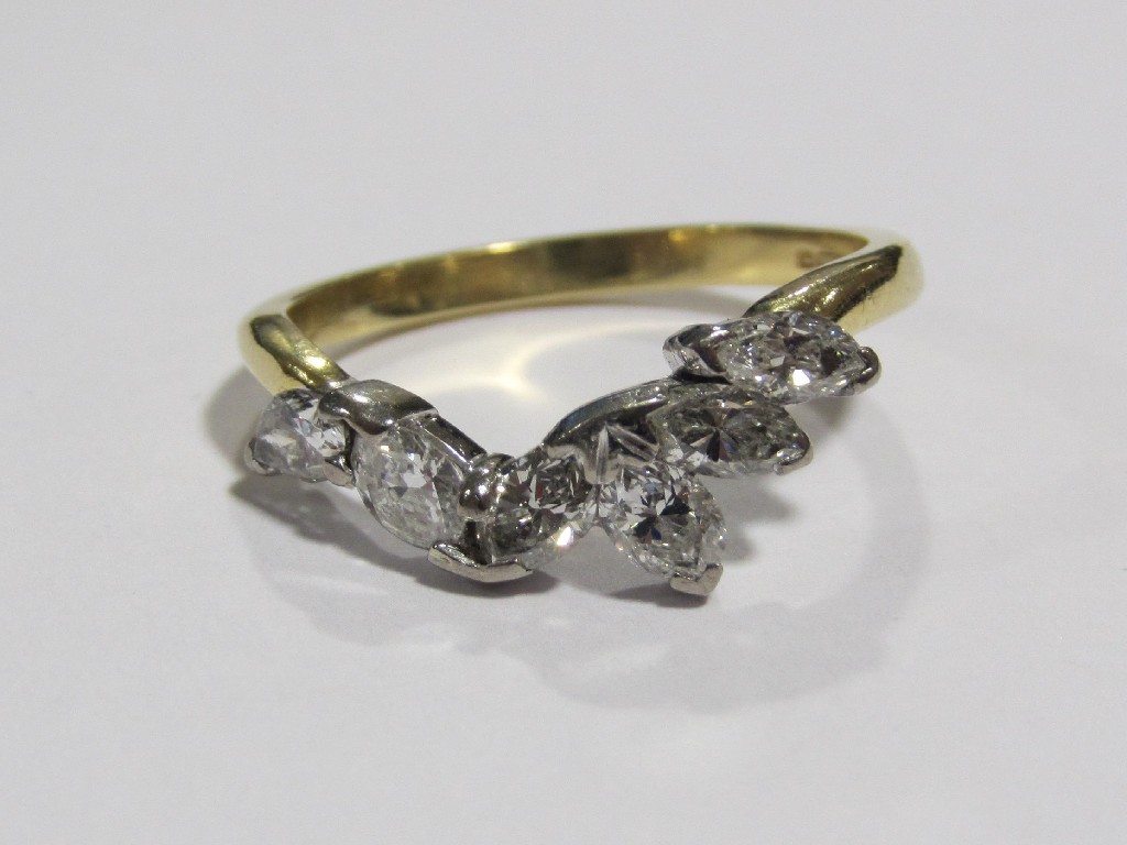 Appraisal: An eighteen carat gold six stone diamond ring with marquise