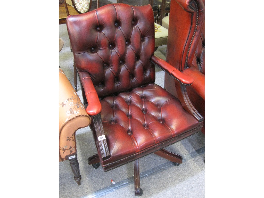 Appraisal: Leather upholstered button back swivel desk chair