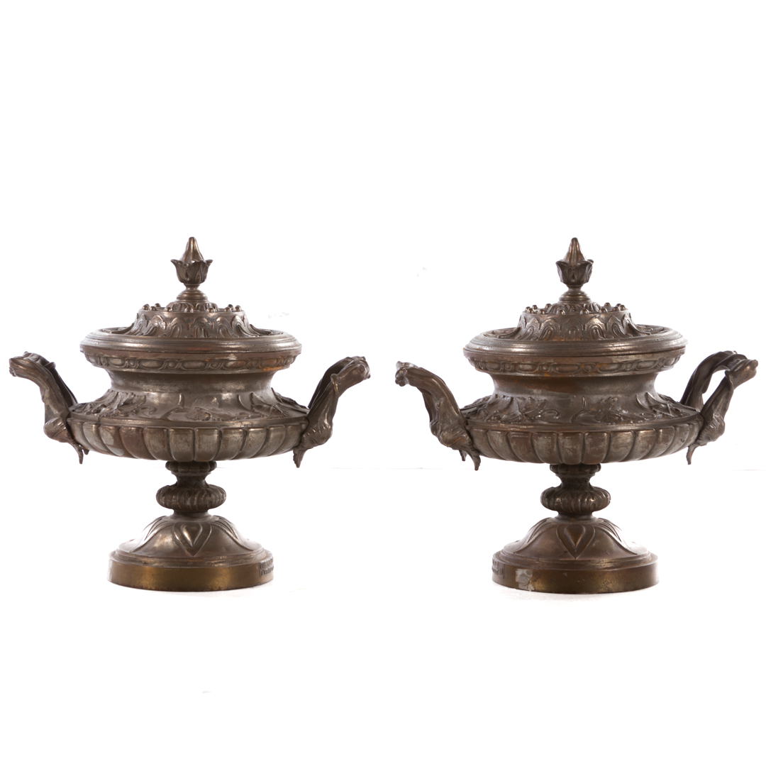 Appraisal: Pair of Classical cast iron urns th Century lidded approximately