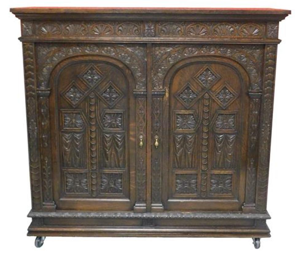 Appraisal: Renaissance style cabinet raised on castor wheels late th early