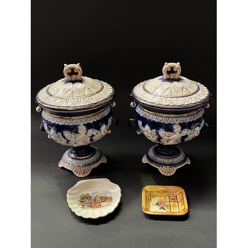 Appraisal: Pair of blue and gilt Italian ceramic lidded urns and