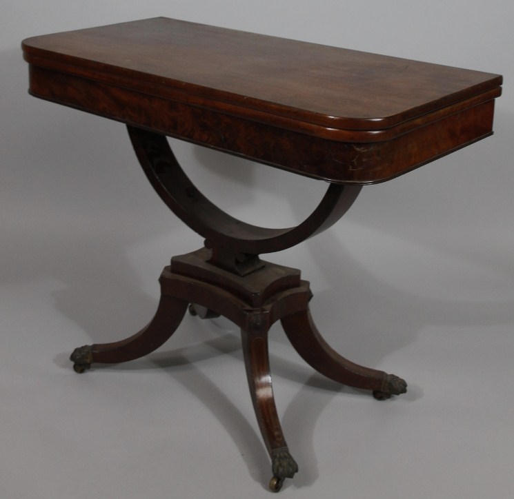 Appraisal: A mid- thC mahogany fold over tea table the oblong