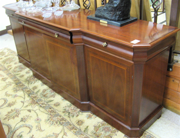 Appraisal: FEDERAL STYLE MAHOGANY BREAKFRONT BUFFET having three ogee-form drawers over