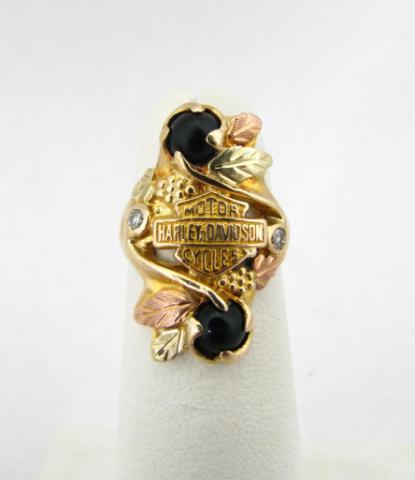 Appraisal: K Yellow and Rose Gold Harley Davidson Ring with two