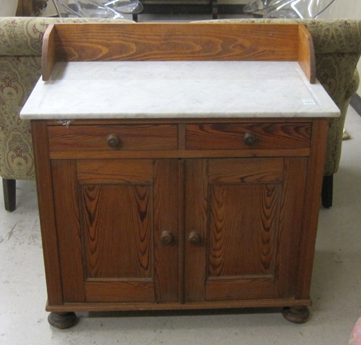 Appraisal: PINE MARBLE-TOP WASHSTAND Continental early th century having a rectangular