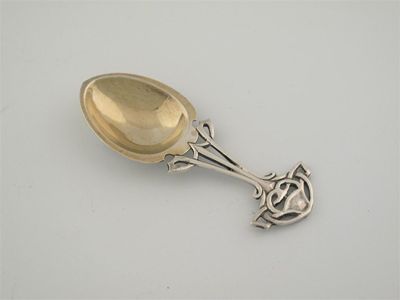 Appraisal: An Edwardian Art Nouveau spoon with an egg shaped gilt