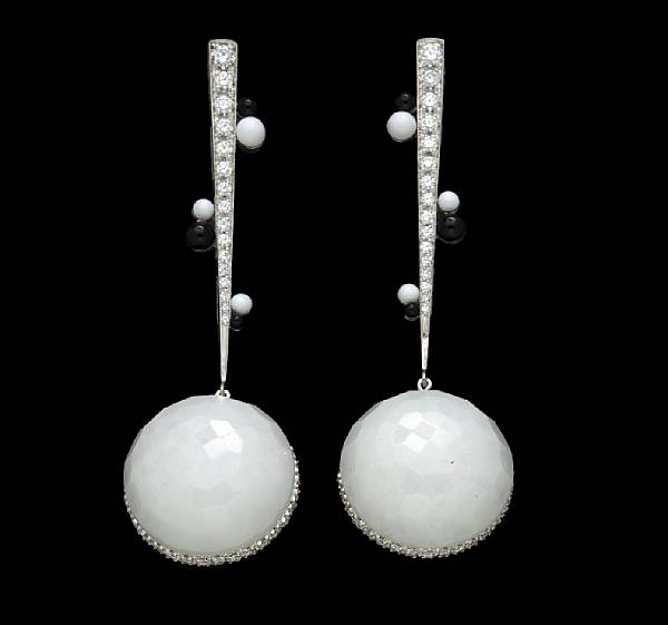 Appraisal: A pair of faceted black and white onyx diamond and