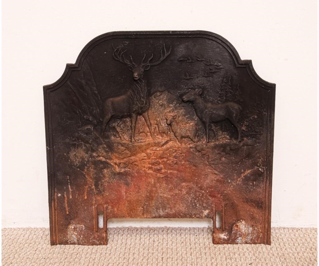 Appraisal: Cast iron fireback with deer relief figures x Condition Dirty