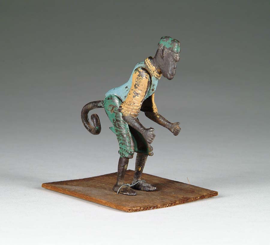 Appraisal: FULLY ARTICULATED CAST IRON MONKEY ATTRIBUTED TO IVES A finely