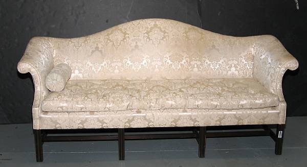 Appraisal: A George III style mahogany camel back sofa mid th