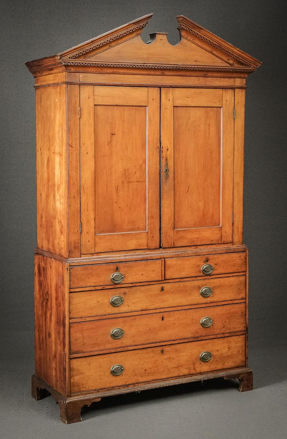 Appraisal: CHIPPENDALE CHERRY CABINET-ON-CHEST PREDOMINANTLY LATE TH CENTURYChippendale Cherry Cabinet-on-Chest Predominantly