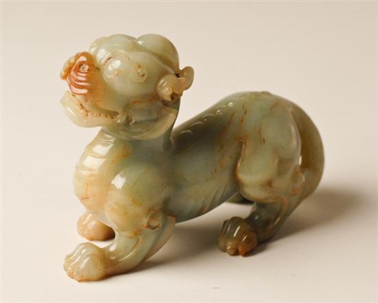 Appraisal: Chinese Celadon and Russett Jade carved mounted Mythical Beast H