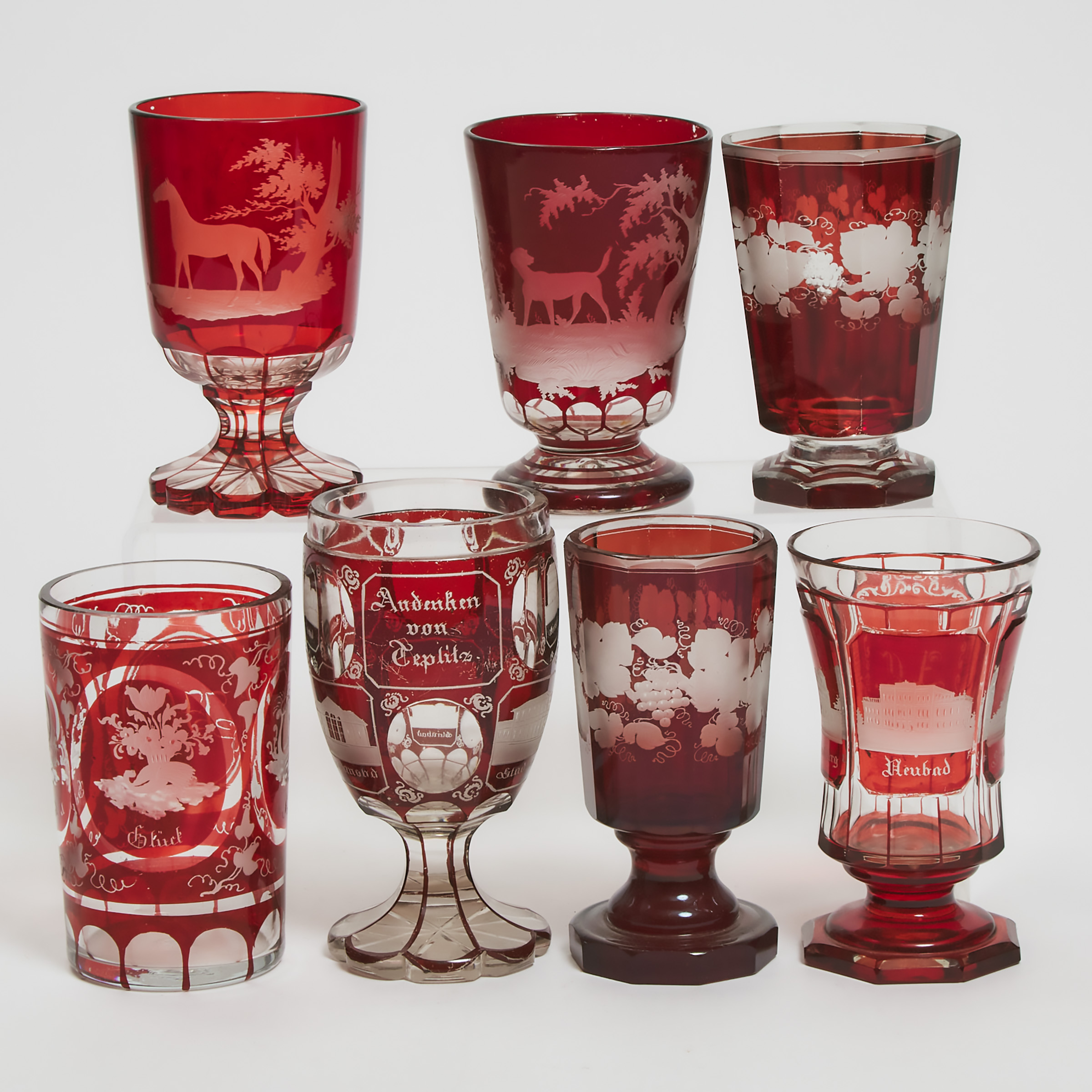 Appraisal: Seven Bohemian Red Overlay Cut and Etched Glass Goblets and