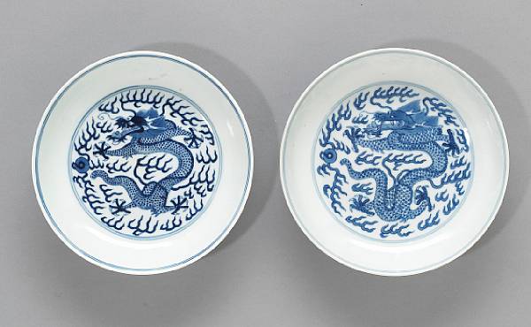 Appraisal: Two blue and white porcelain dragon dishes Daoguang and Guangxu