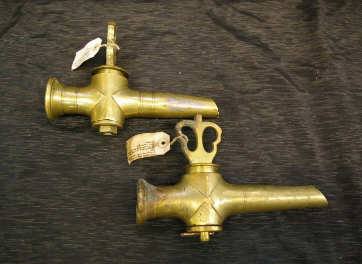 Appraisal: Pair of French Bronze Brewer's Taps with Crown Keys fourth