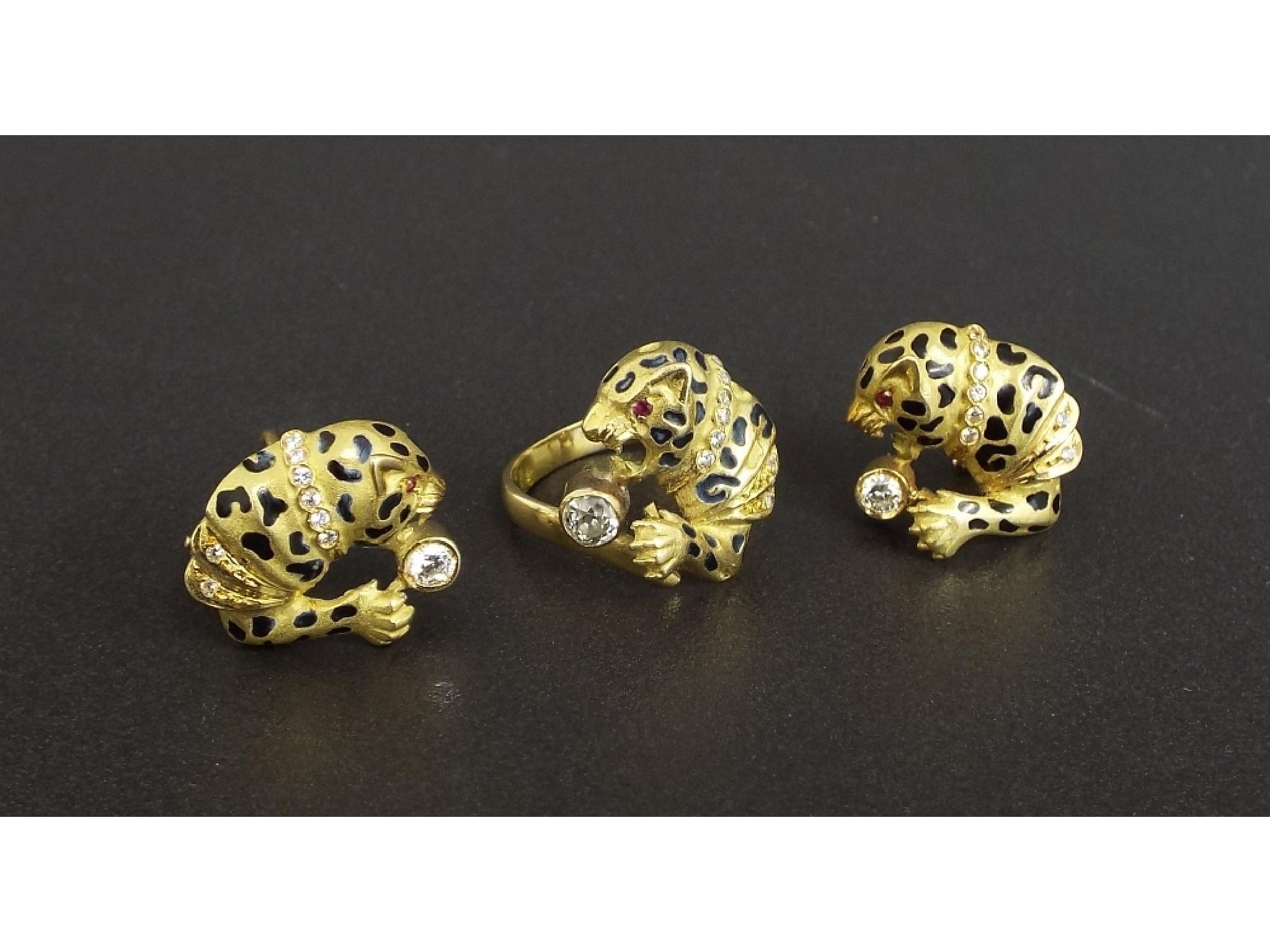 Appraisal: ct diamond and enamel leopard design ring with matching earrings