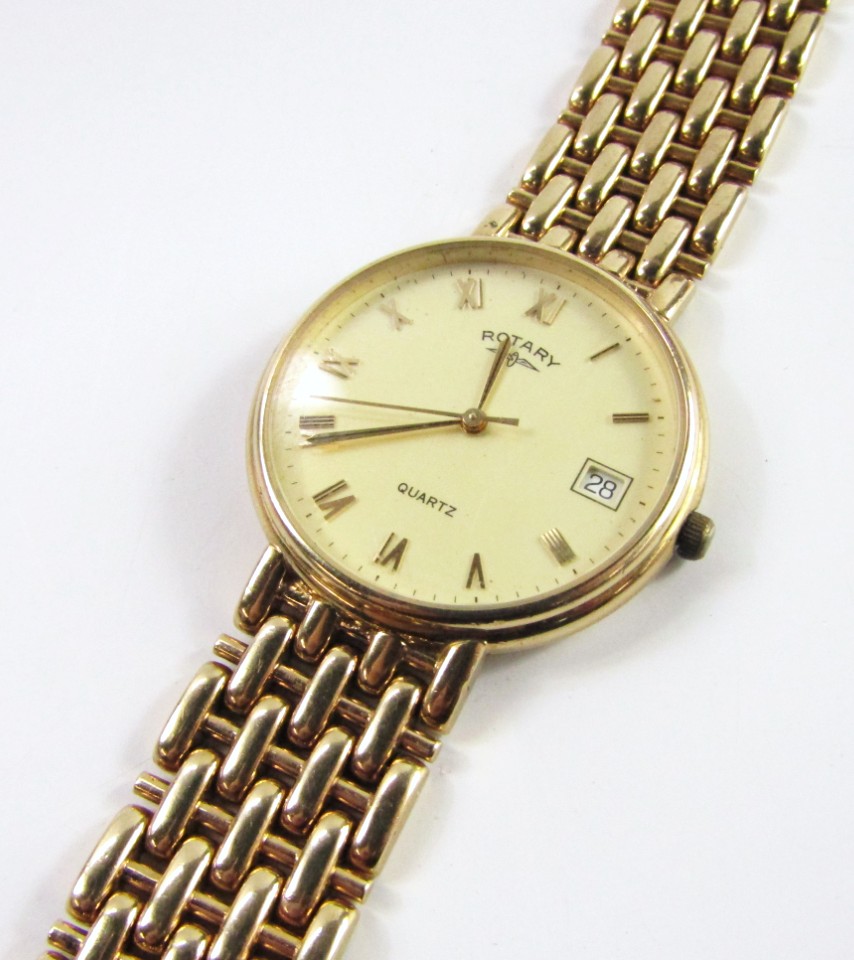 Appraisal: A gent's Rotary wristwatch with quartz movement and champagne dial