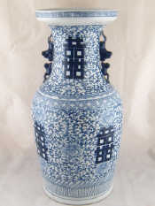 Appraisal: A tall blue and white Chinese vase with formal decoration